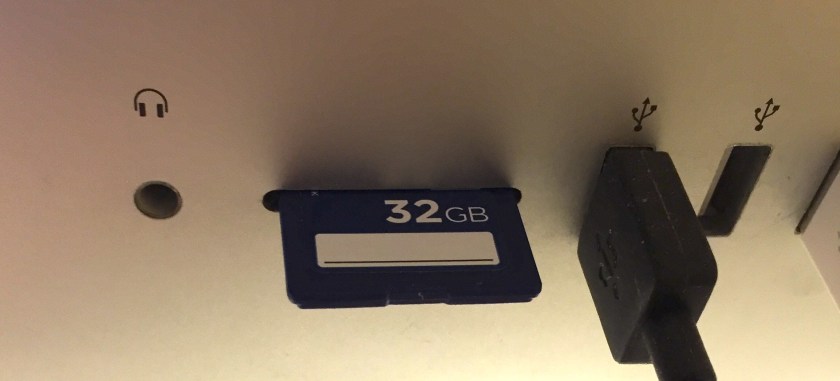 Memory card (32 gigabytes) in the card slot on the back of my Mac computer.