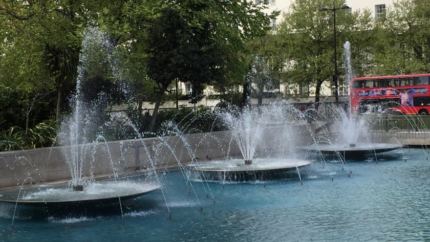 3 large fountains next to each other.
