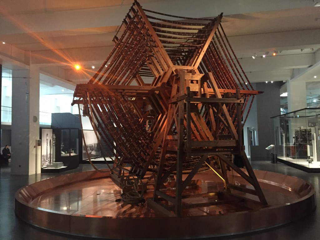 Huge transmitter, made of lots of large hexagonal sections positioned one behind the other.