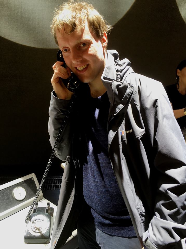 Me pretending to use an old rotary dial phone.