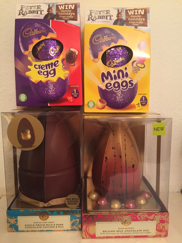 2 Cadbury's Easter Eggs, for Creme Egg and Mini Egg, plus 2 Marks & Spencer Easter Eggs, one in halves of dark and white chocolate, and the other all Belgian milk chocolate with mini truffles.