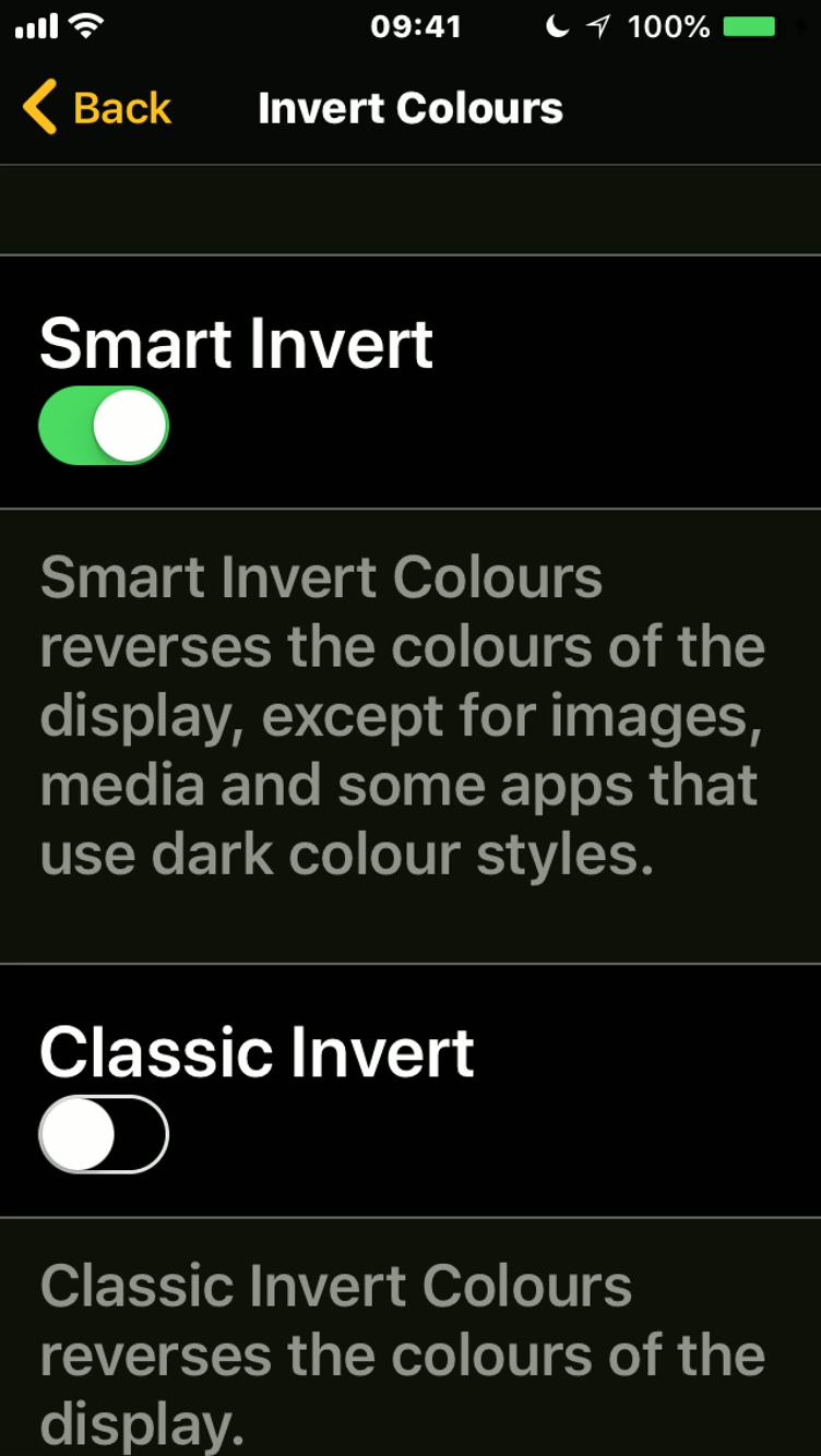 iPhone screenshot of the Invert Colours menu, with options for Smart Invert, where it inverts everything except media like photos and videos, and Classic Invert, where it inverts everything.
