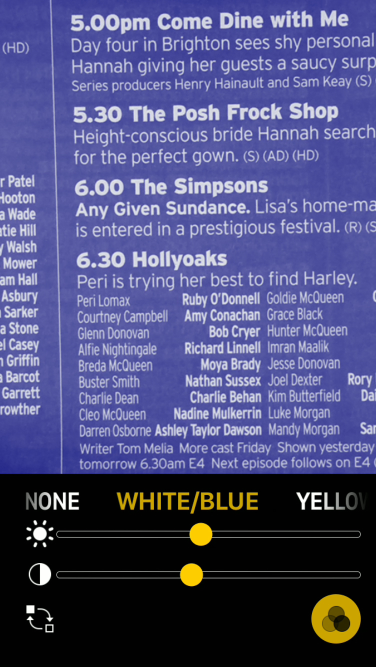 iPhone screenshot of the Magnifier app. It is being used to read the schedule for Channel 4 in a TV guide magazine, using a colour setting that gives white text on a blue background.