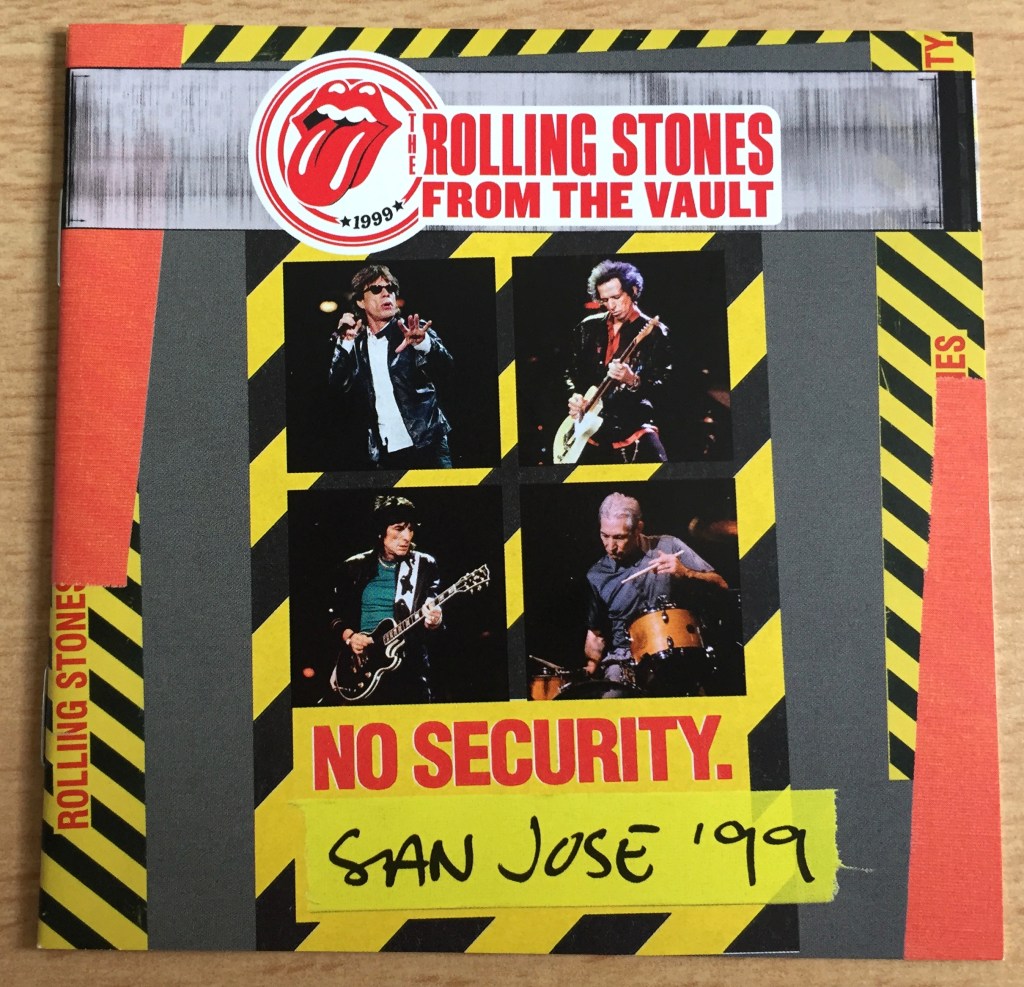 Booklet for the Rolling Stones CD and DVD entitled No Security, San Jose 99, part of their From The Vault series. 4 photos in the centre, arranged 2 by 2, show each of the band members performing at the concert.