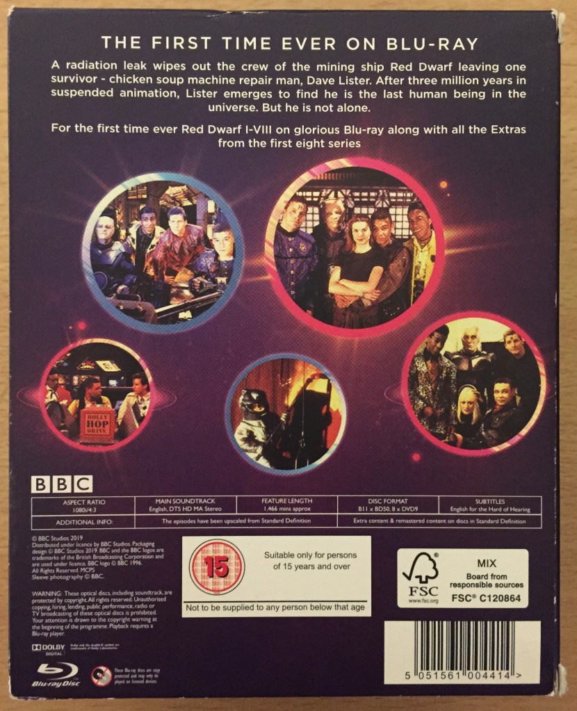 Back of the box for the Red Dwarf series 1 to 8 Blu-ray box set, featuring a brief description of the show, coloured circles featuring photos of the characters, and technical details about the set.