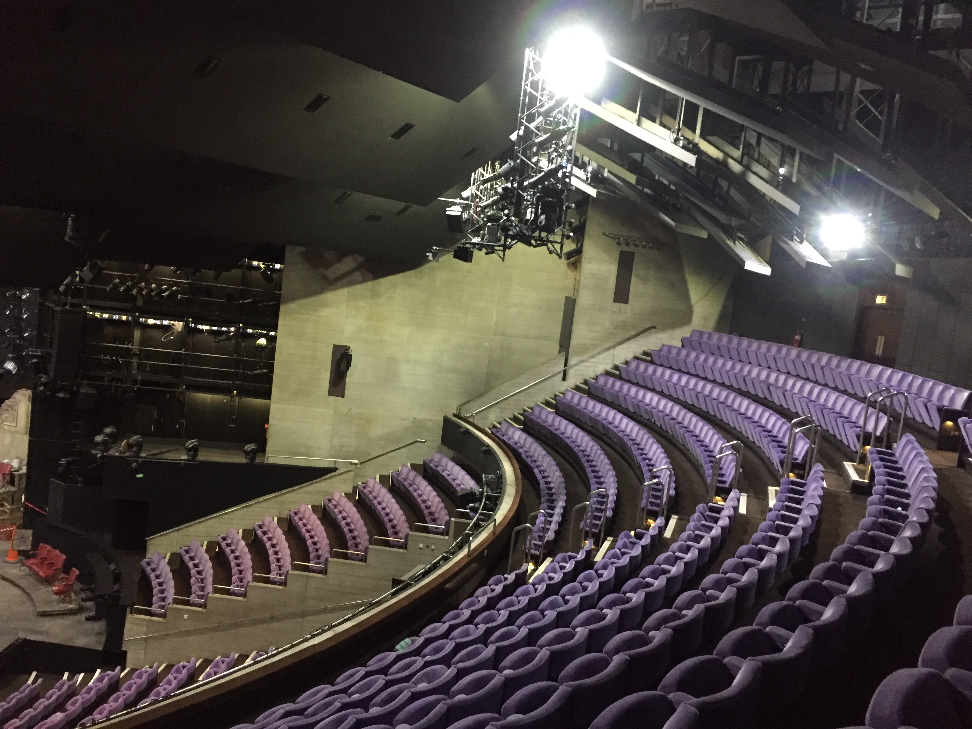 Seating in the large National Theatre auditorium, with 16 rows arranged in a semicircle around the front of the stage.
