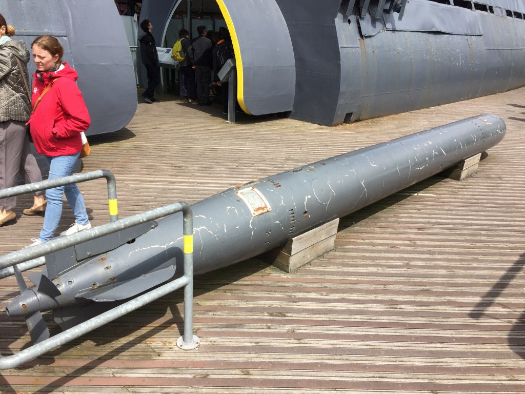 A long grey torpedo missile