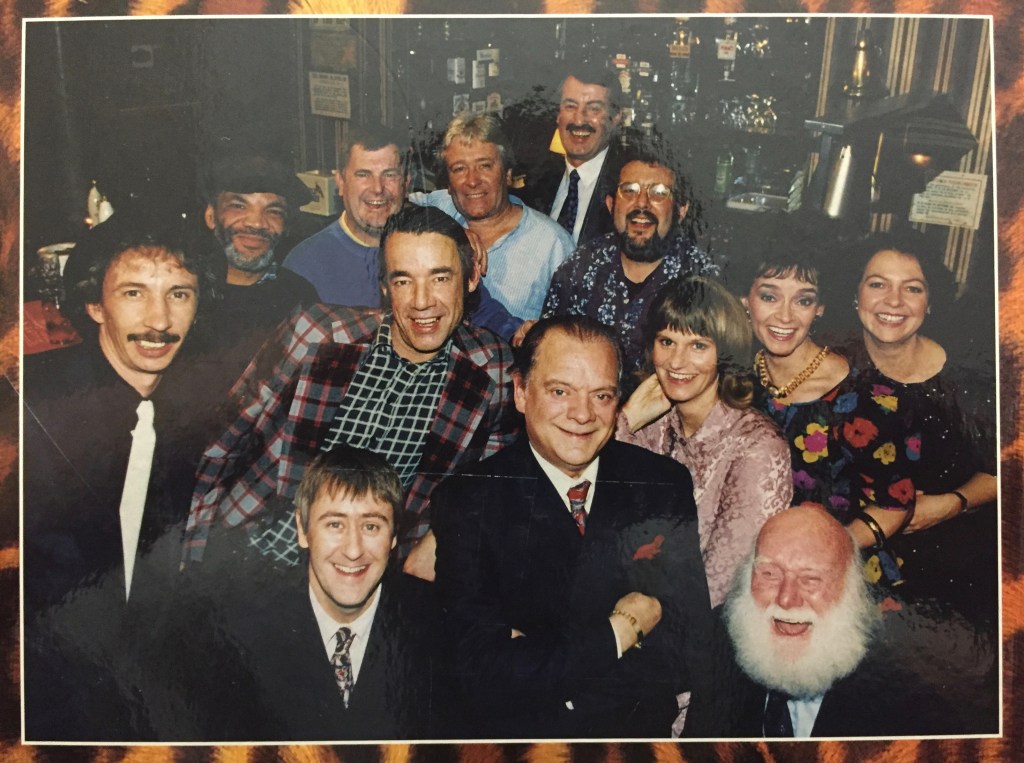 Group photo of the cast from Only Fools And Horses, including the writer of the series, John Sullivan.