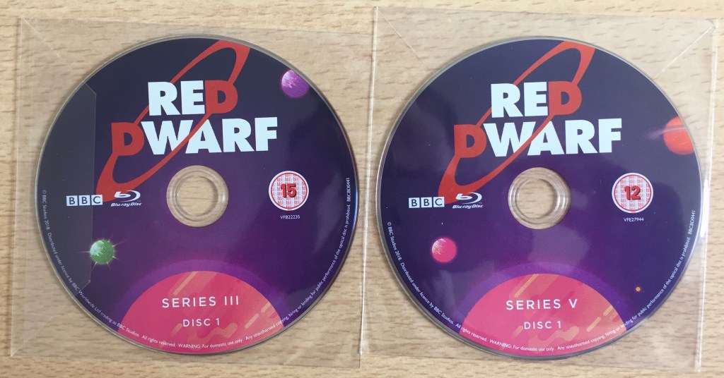 Replacement Blu-ray discs for the Red Dwarf box set, for series 3 disc 1 and series 5 disc 1.