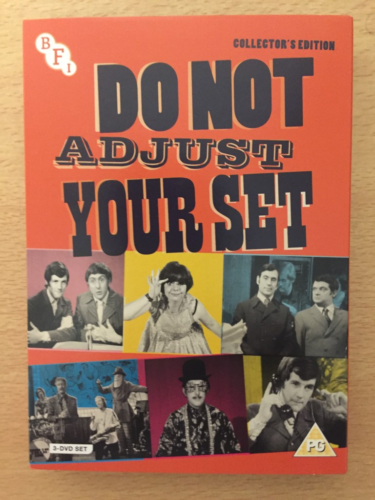 DVD cover for Do Not Adjust Your Set, Collector's Edition. Features a black and white image of the stars of the show, who are Michael Palin, Eric Idle, Terry Jones, David Jason and Denise Coffey.