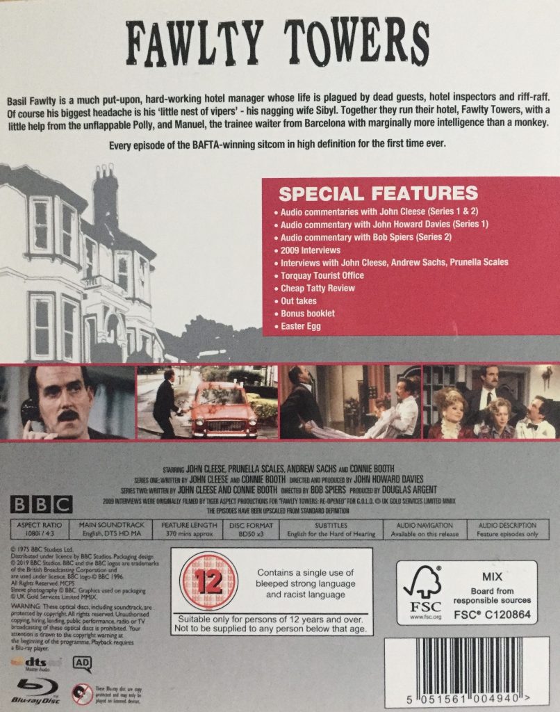 Back cover of the Blu-ray case for Fawlty Towers, with a background image of the hotel, and a small row of photos from the show. The special features listed include audio commentaries by John Cleese and the directors of each series, interviews, outtakes and more. The set also includes English subtitles, audio description and audio navigation.