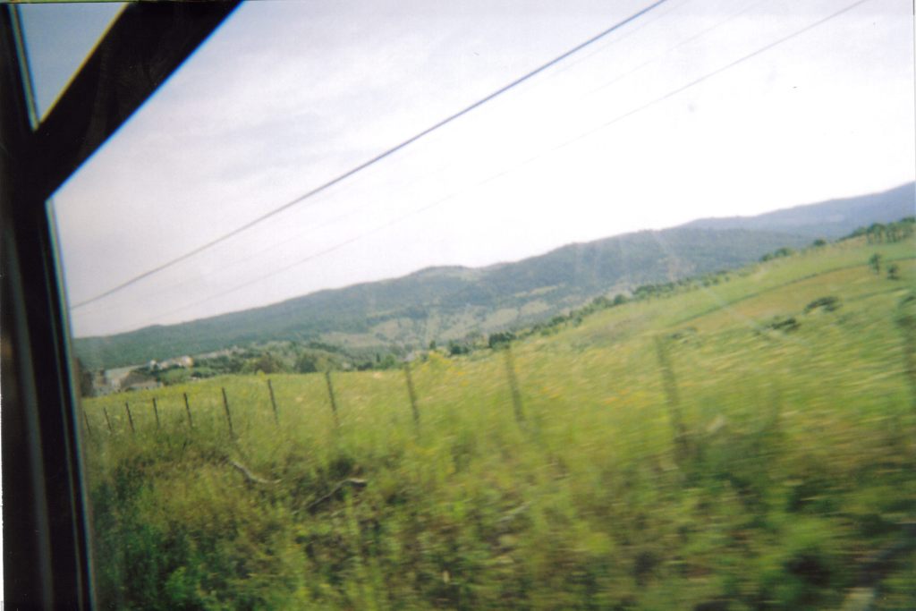 Scenic view of fields and hills from the train in Ronda.