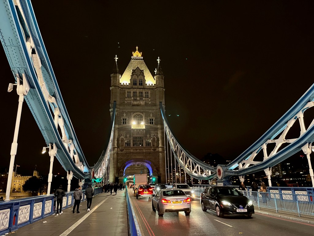 View from the road towards one of the tall ornate towers on Tower Bridge.