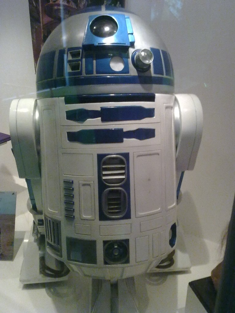 Life-size model of R2-D2, the small blue and white robot from Star Wars.