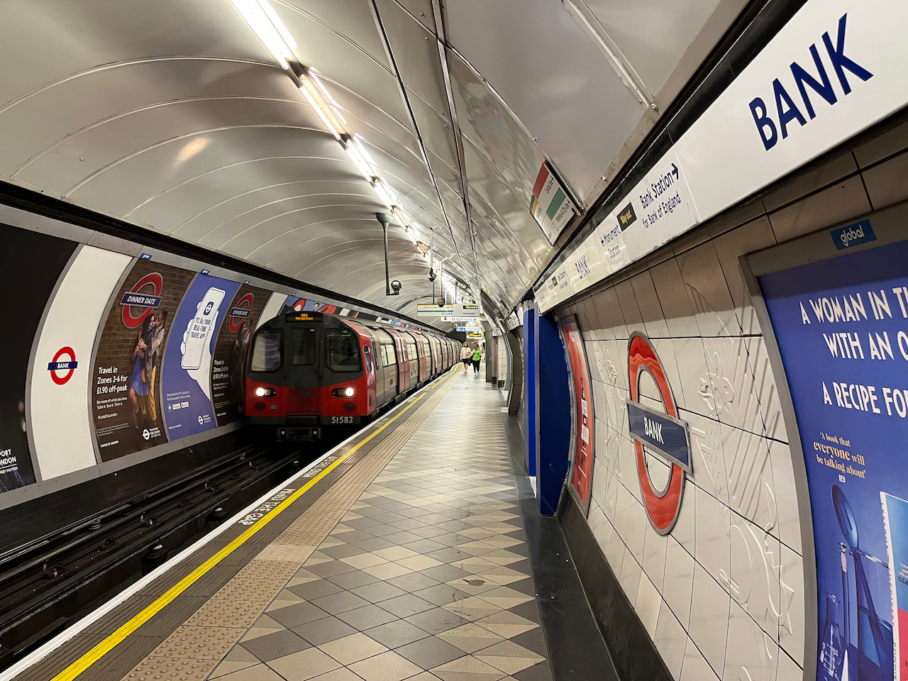 The old northbound platform for the Northern Line at Bank, that is still in use, with a Tube train just pulling in. The platform is much narrower than the new Northbound one.