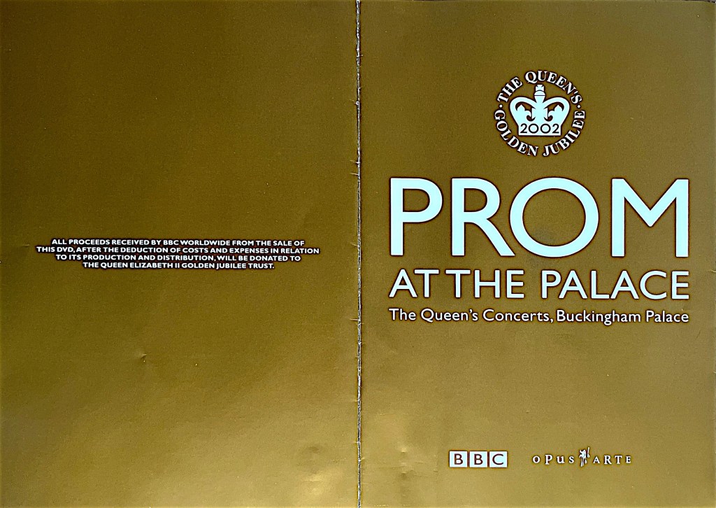 Outer cover of the DVD booklet for the Prom At The Palace, with white text on a gold background. The front cover has the show's title, while the back cover has text explaining that proceeds from the DVD sales, after costs and expenses are deducted, will be donated to the Golden Jubilee Trust.