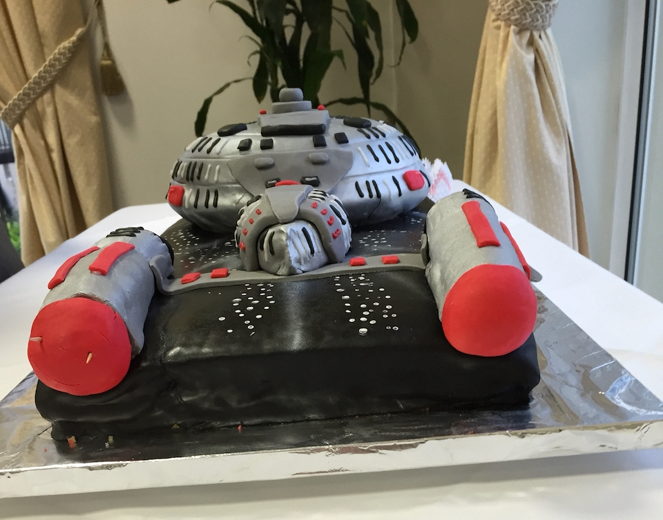 The red and grey thrusters at the back of the Starship Enterprise cake.