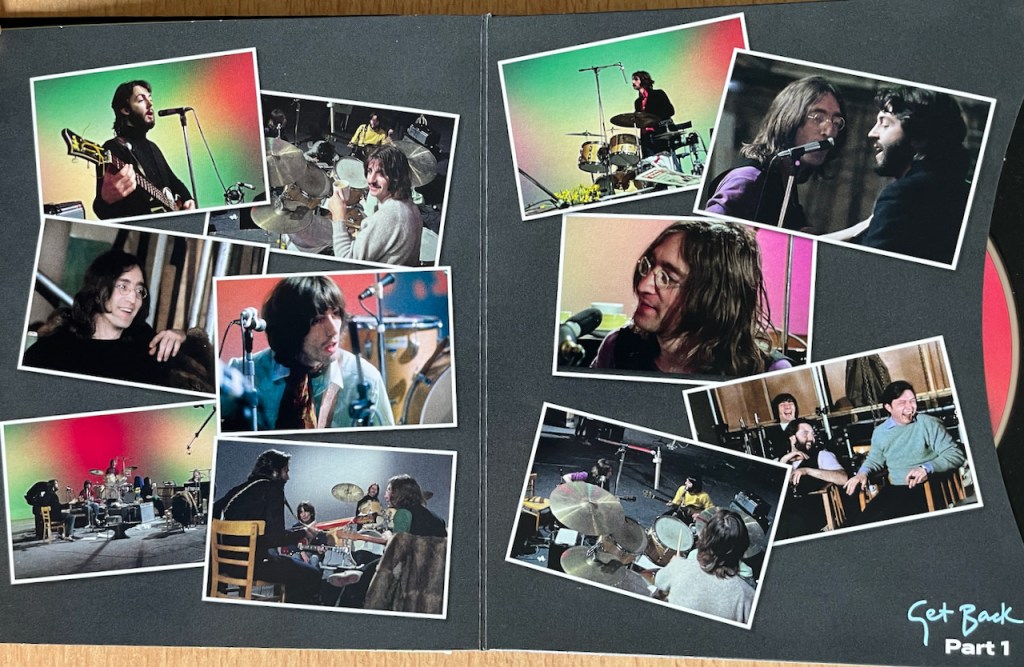 2 pages showing several photos of The Beatles working together in the studio, from Part 1 of their Get Back documentary series, on the inside of their Get Back Blu-ray set.