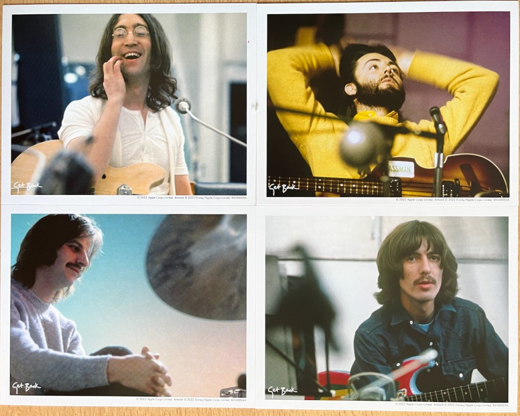 4 postcard sized colour photos, each showing a different member of The Beatles in the studio, from their Get Back Blu-ray set.