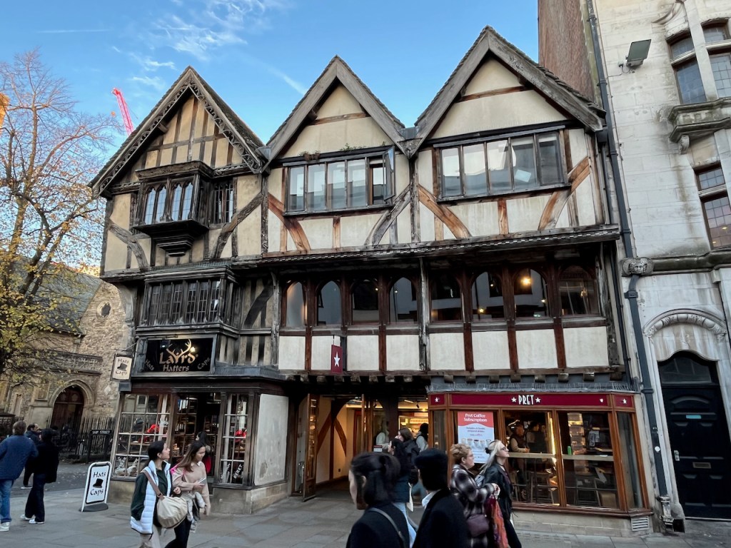 Shops in Tudor style buildings in Cornmarket Street in Oxford.