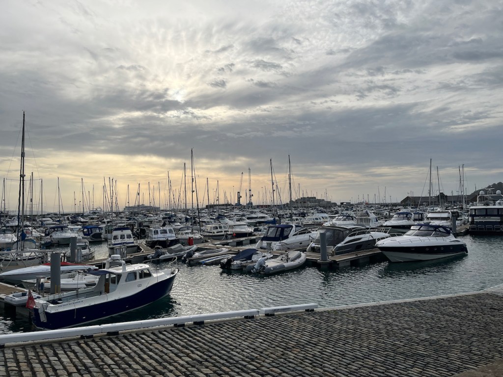 St Peter Port harbour in Guernsey, filled with lots of boats.