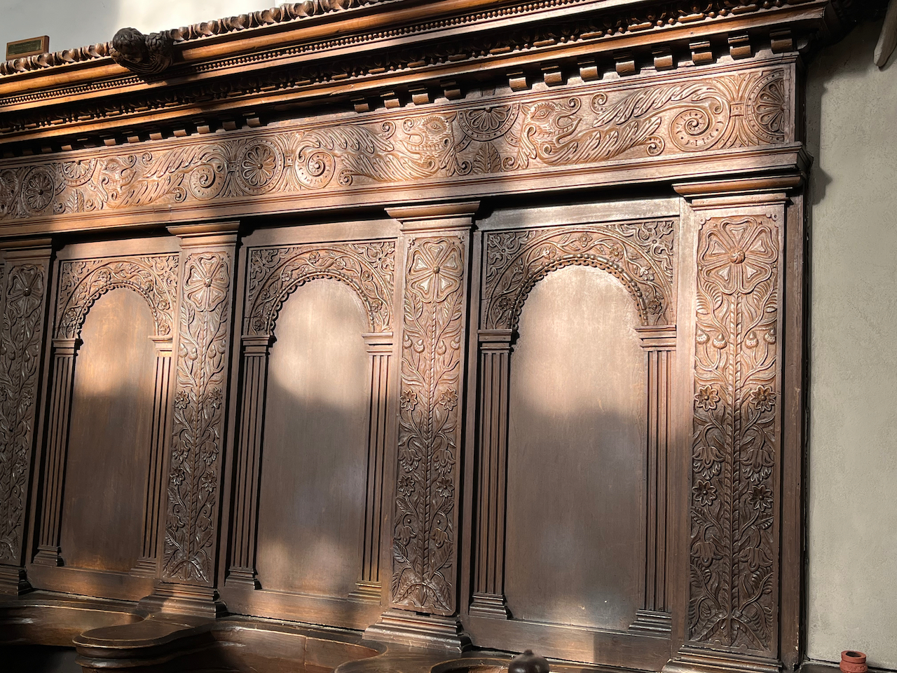 Ornately carved wall panels in Wadham College Chapel.