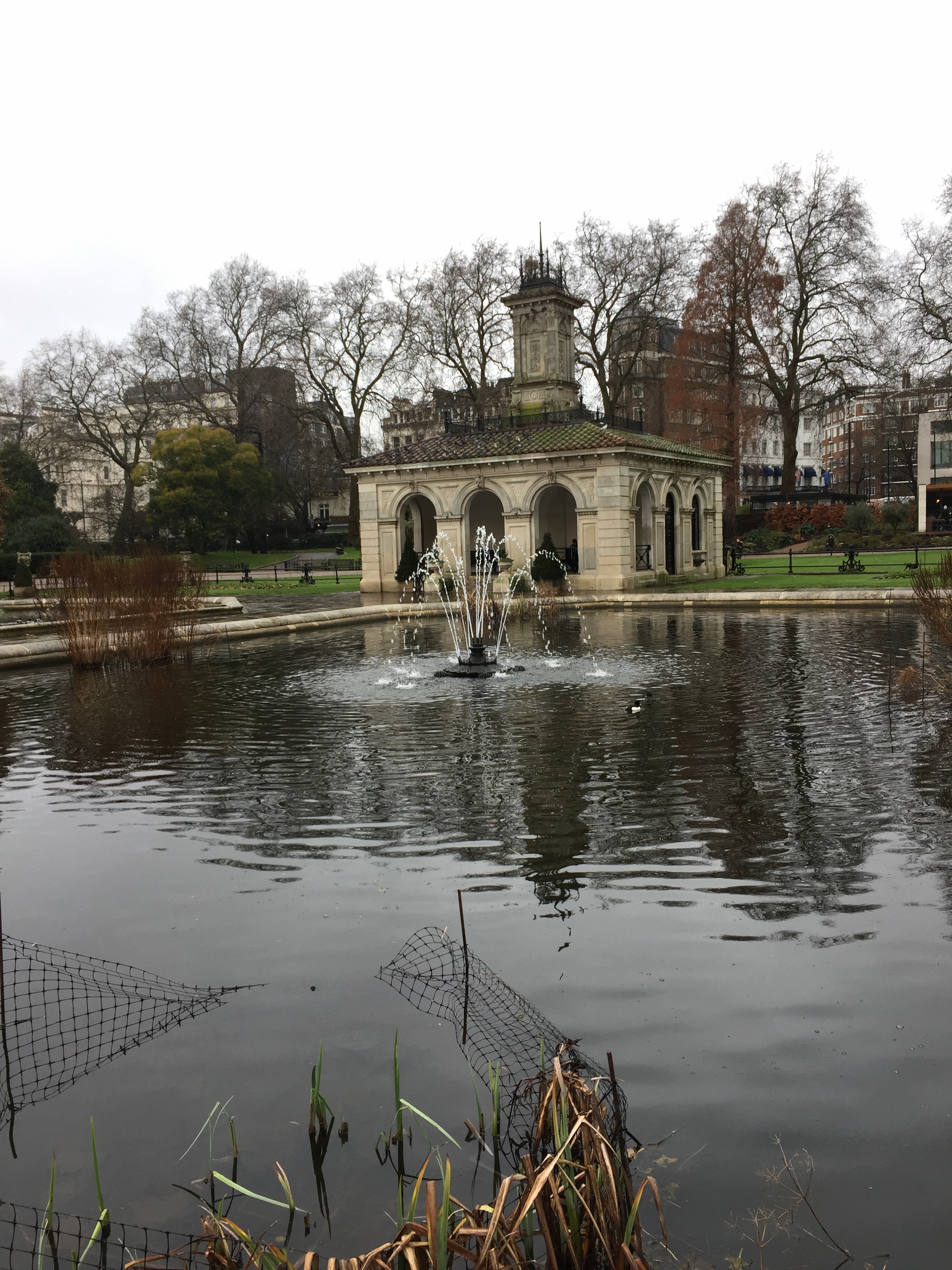 The Italian Fountains in Kensington gardens, in the middle of a very large round pond.