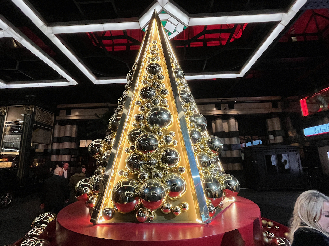 The Christmas tree outside the Savoy. It's actually a lit up pyramid rather than a tree, full of reflective metal balls in many different sizes.