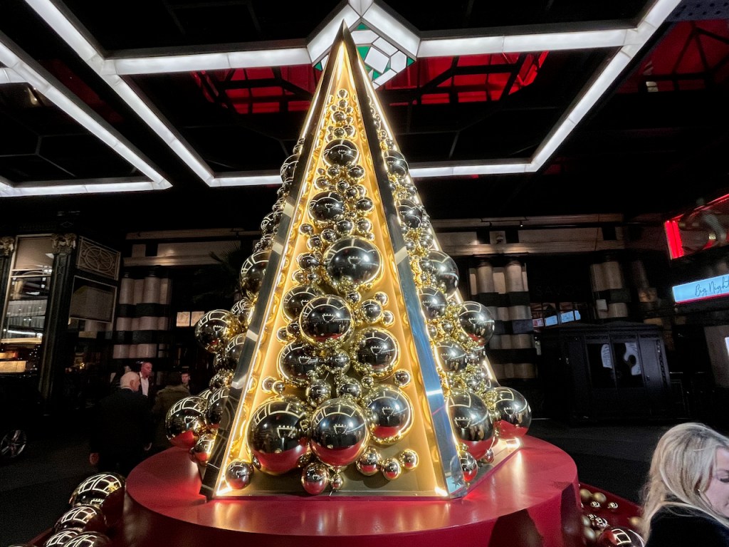 The Christmas tree outside the Savoy. It's actually a lit up pyramid rather than a tree, full of reflective metal balls in many different sizes.