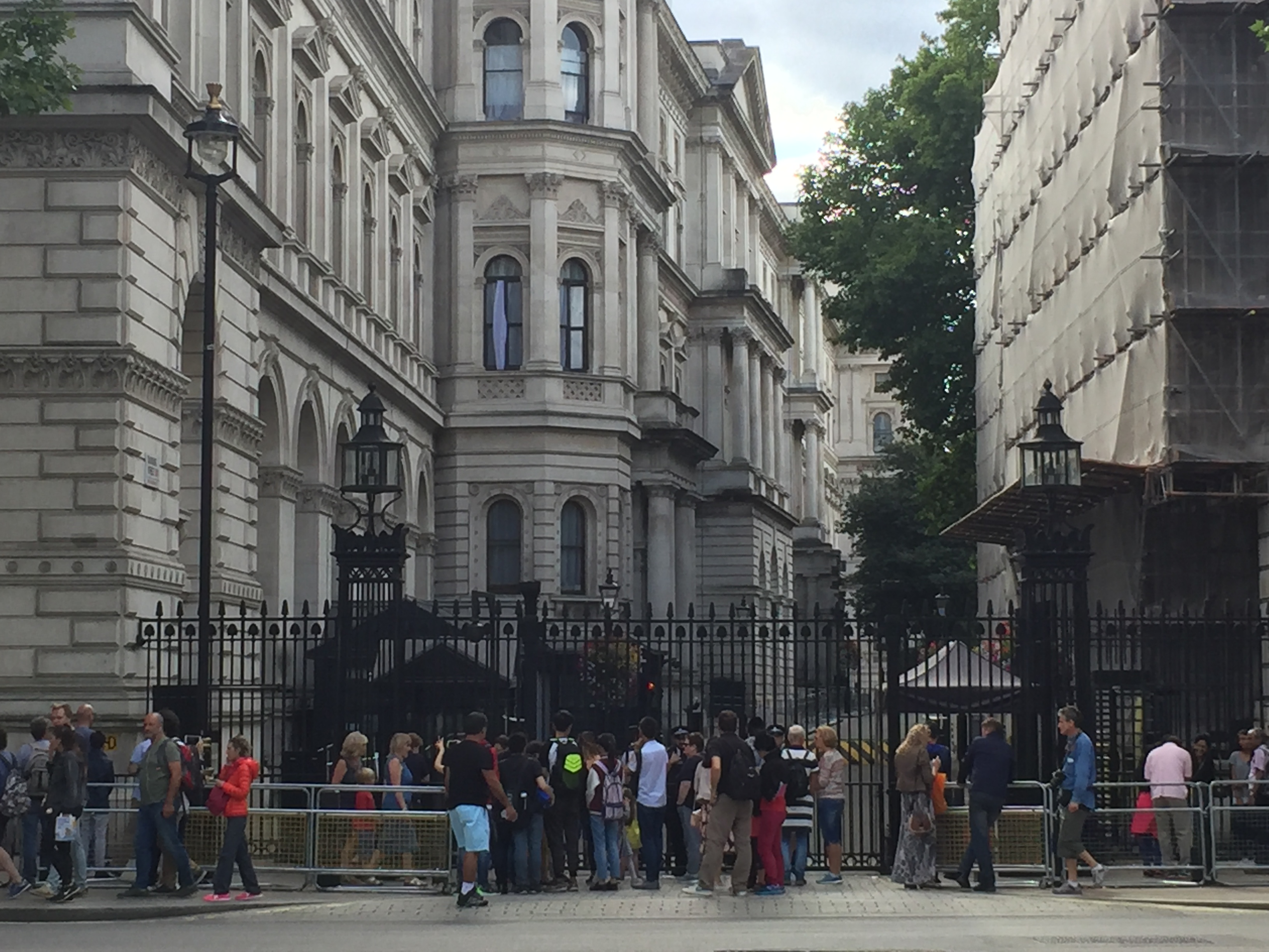 People gathered outside the gates of Downing Street.