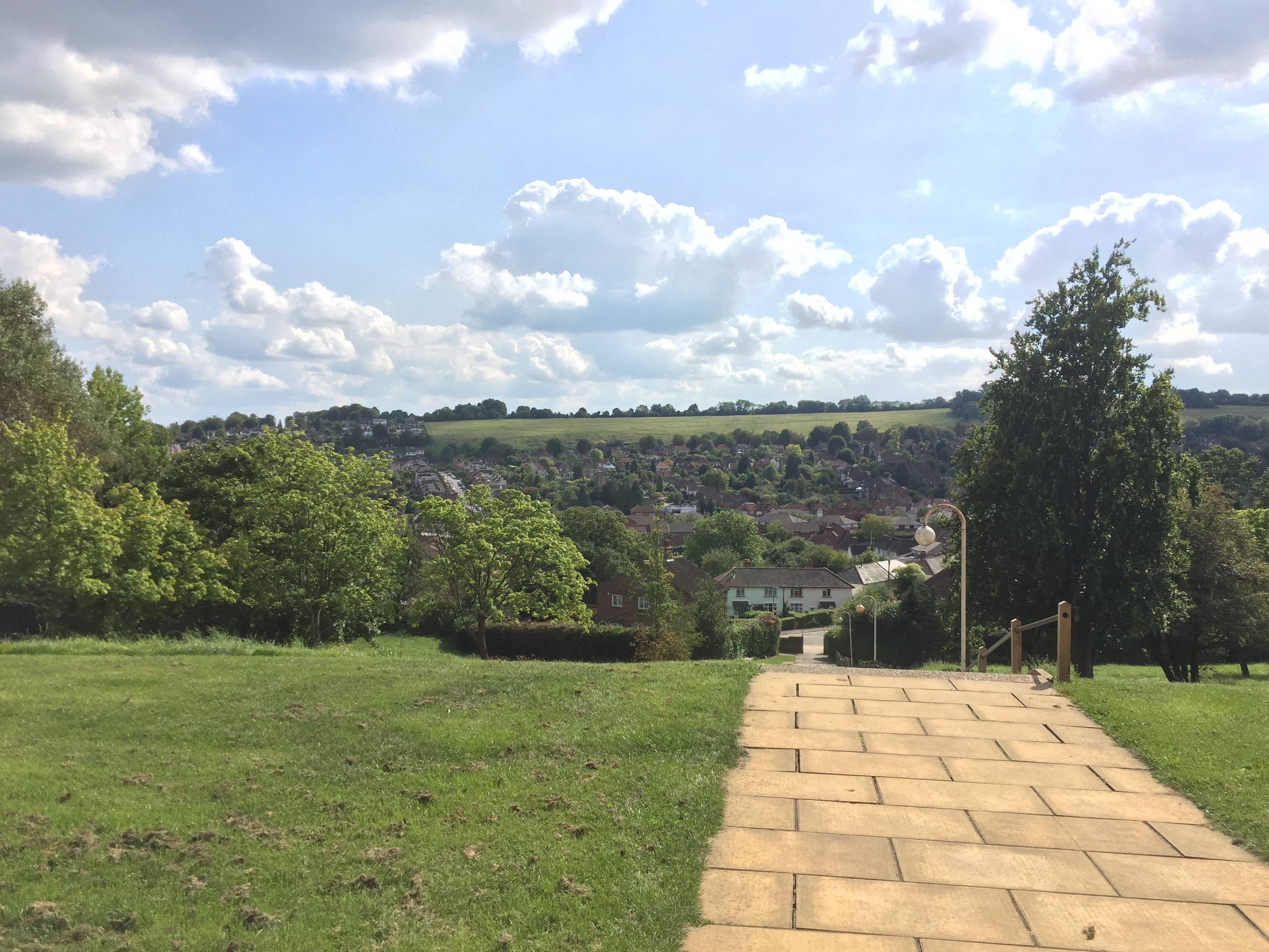 A view over the town of Guildford in the distance, from the lawn outside the front of the cathedral.