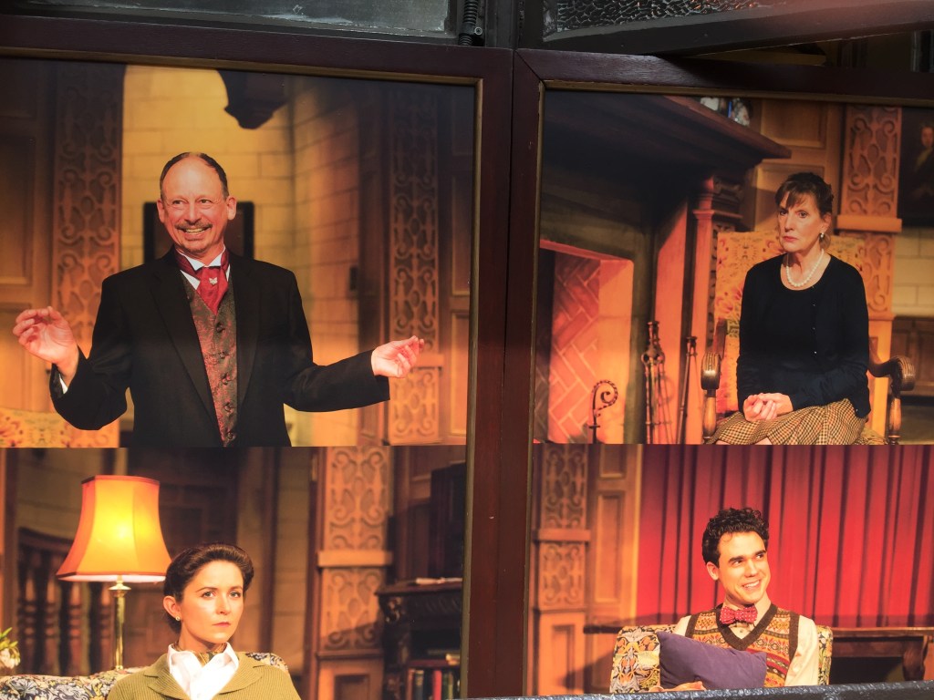 Images of cast members in The Mousetrap, displayed in the outer windows of St Martin's Theatre, including 2 men with cheerful expressions, and 2 ladies looking more serious.