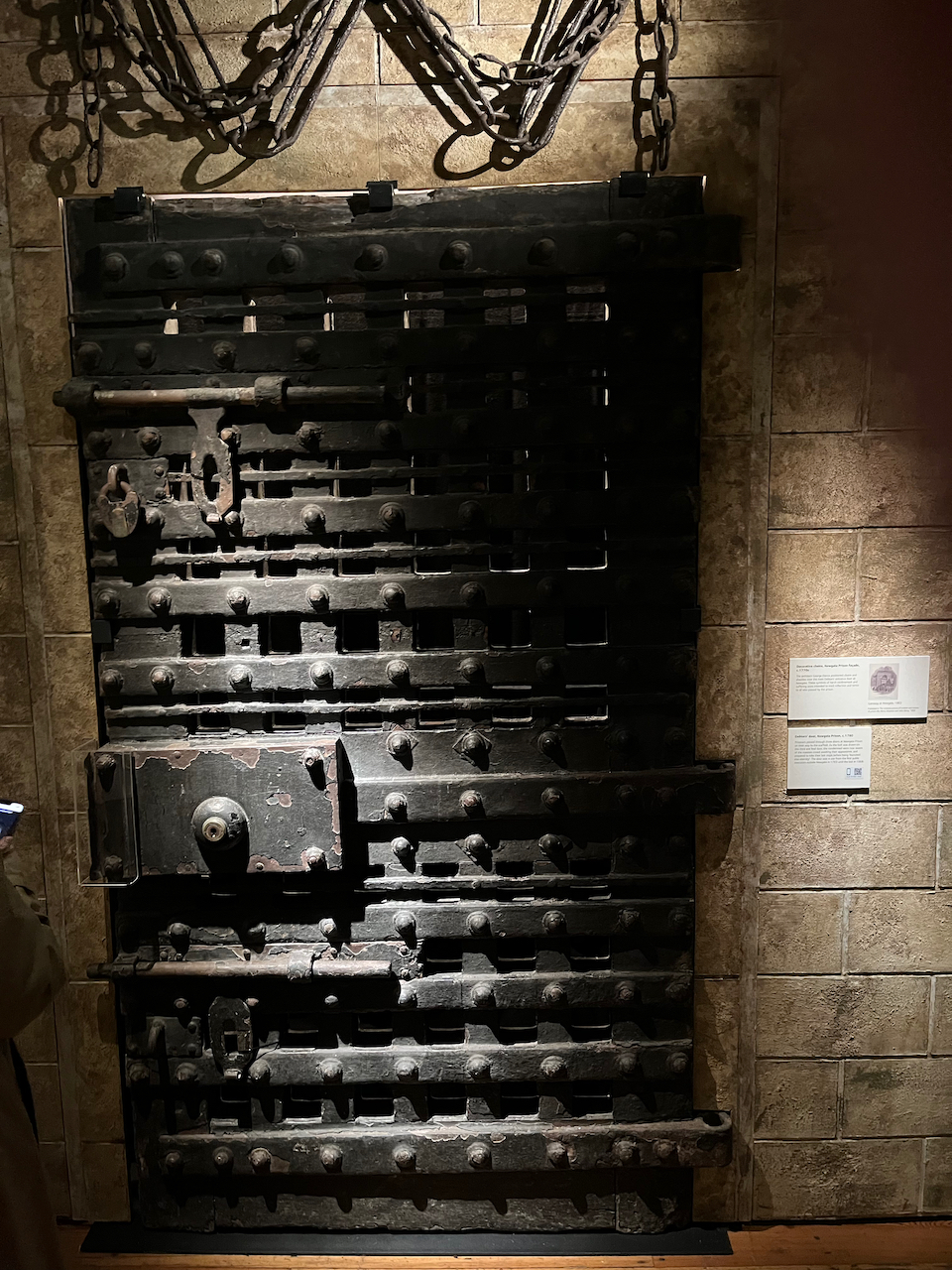 The huge thick imposing metal Debtors Door through which condemned prisoners would pass through to be executed at Newgate Prison.