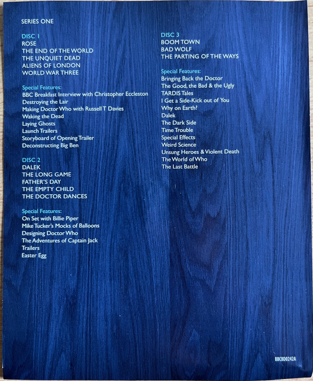 The rear side of the flyer included in the Doctor Who Series 1 Blu-ray set, listing the episodes and extras on each of the 3 discs.