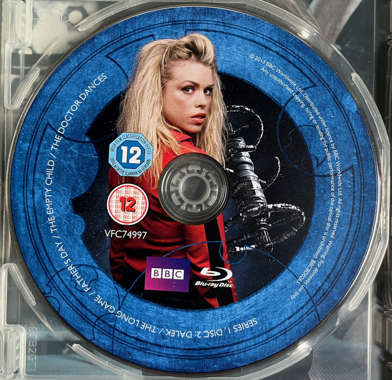 Doctor Who Series 1, Blu-ray Disc 2, featuring an image of Rose Tyler in a red jacket next to a space station with circular sections around a central column.