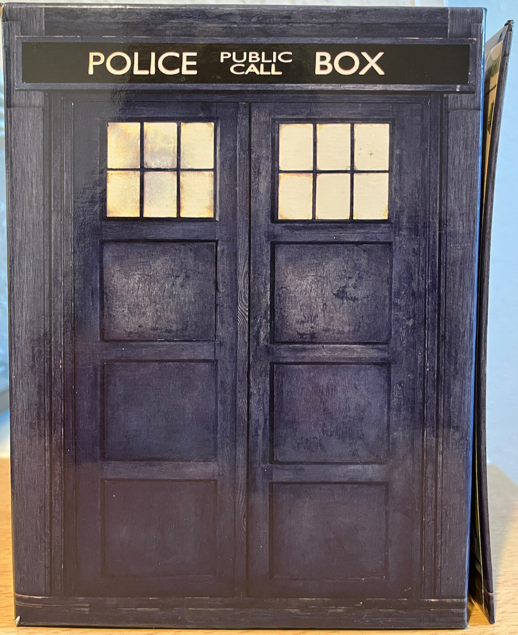 One side of the blue police box style Tardis set for the Doctor Who series 1 DVDs.
