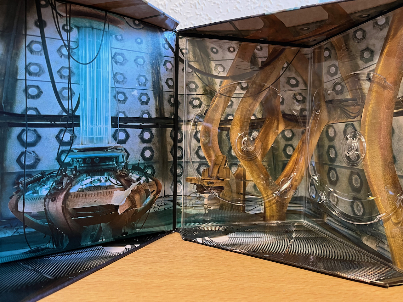 Close-up of the inside of the Tardis-style box set for Doctor Who Series 1, designed to look like the inside of the Tardis, with a backdrop showing the circular central console and hexagonal designs on the walls.