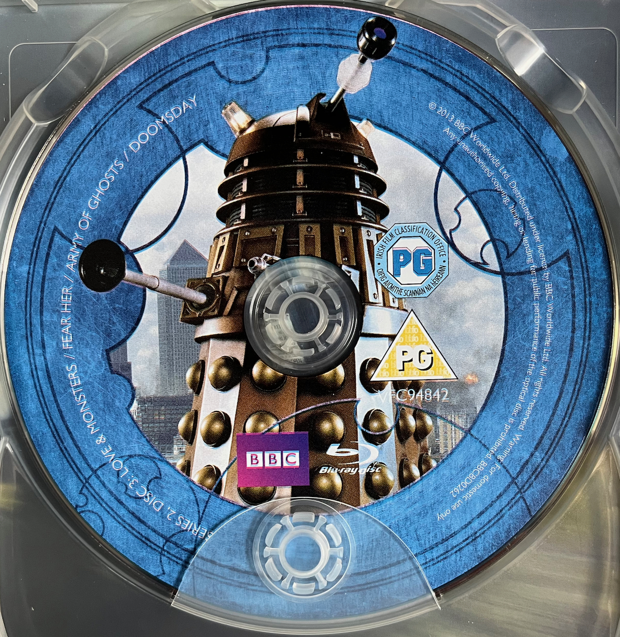 Disc 3 in the Doctor Who Series 2 Blu-ray set, featuring a photo of a Dalek. A blue border around the edge of the disc contains the episode names and copyright information.