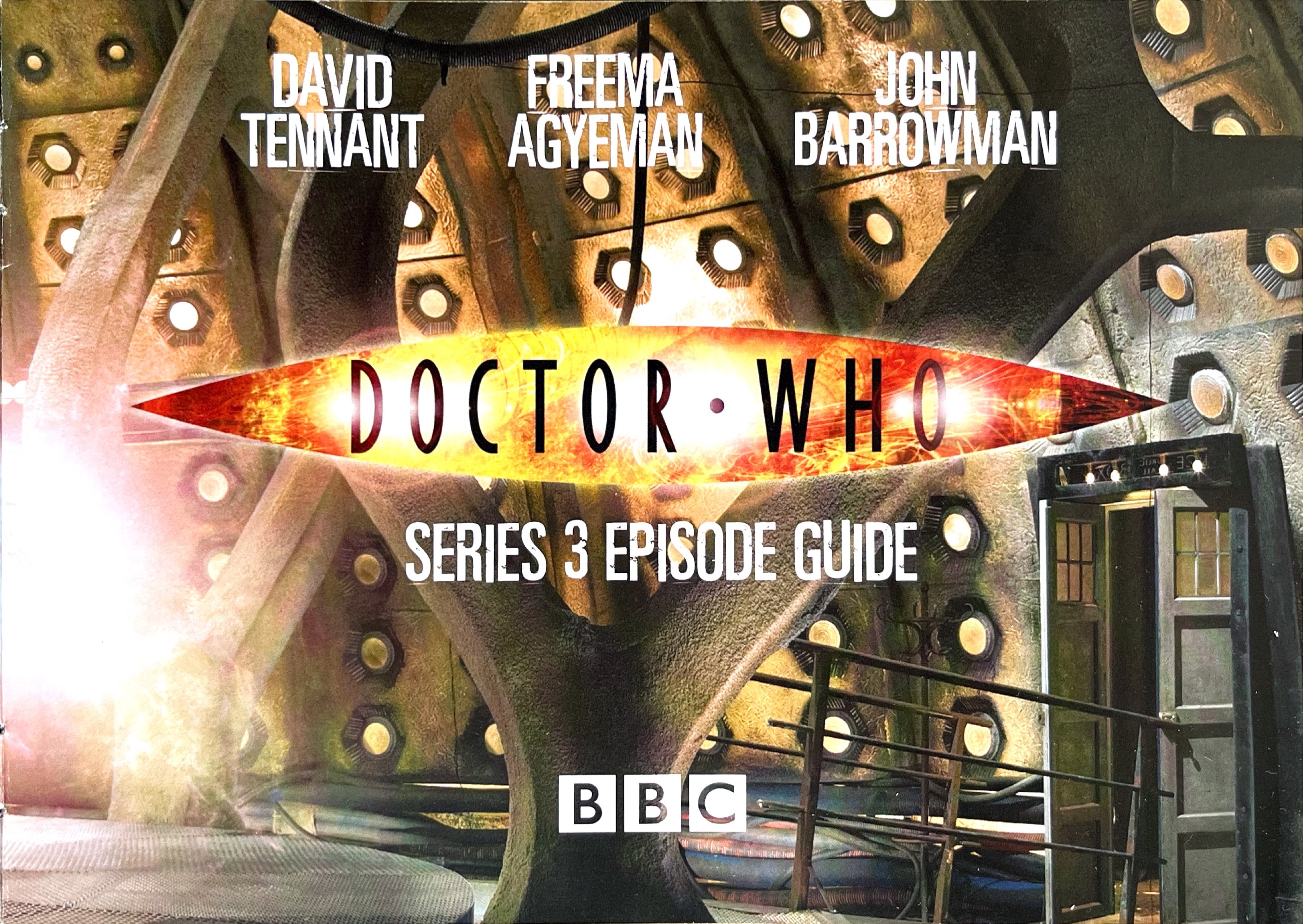 Title page from the Doctor Who Series 3 Episode Guide booklet included with the original DVD release. Against a backdrop of the inside of the Tardis, the names David Tennant, Freema Agyeman and John Barrowman appear in white text above the fiery coloured Doctor Who logo. Below that is the episode guide title in white text, and then the white BBC logo is at the bottom of the page.