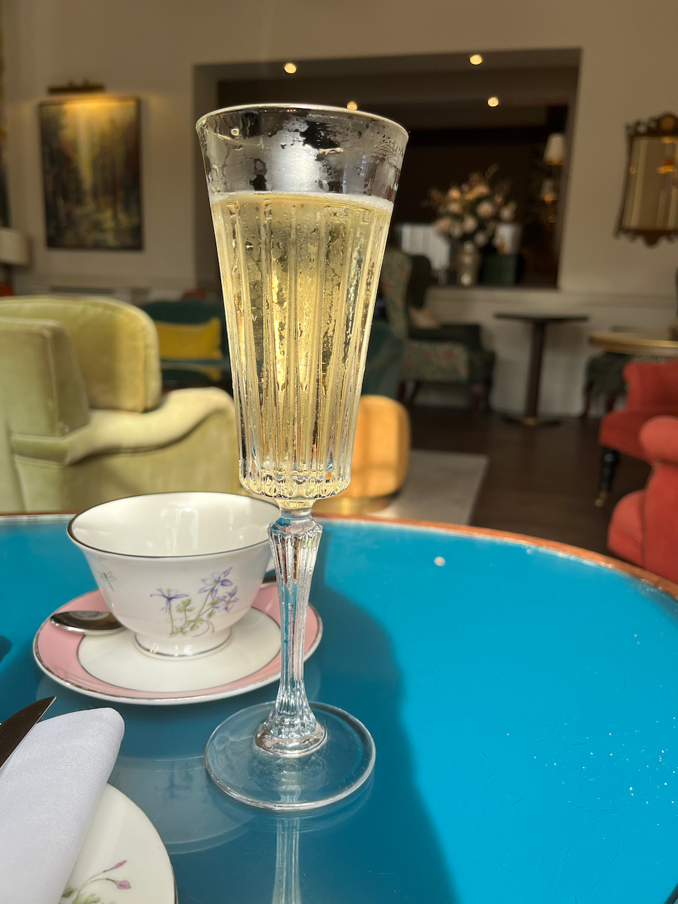 Glass of champagne in a tall, elegant glass.