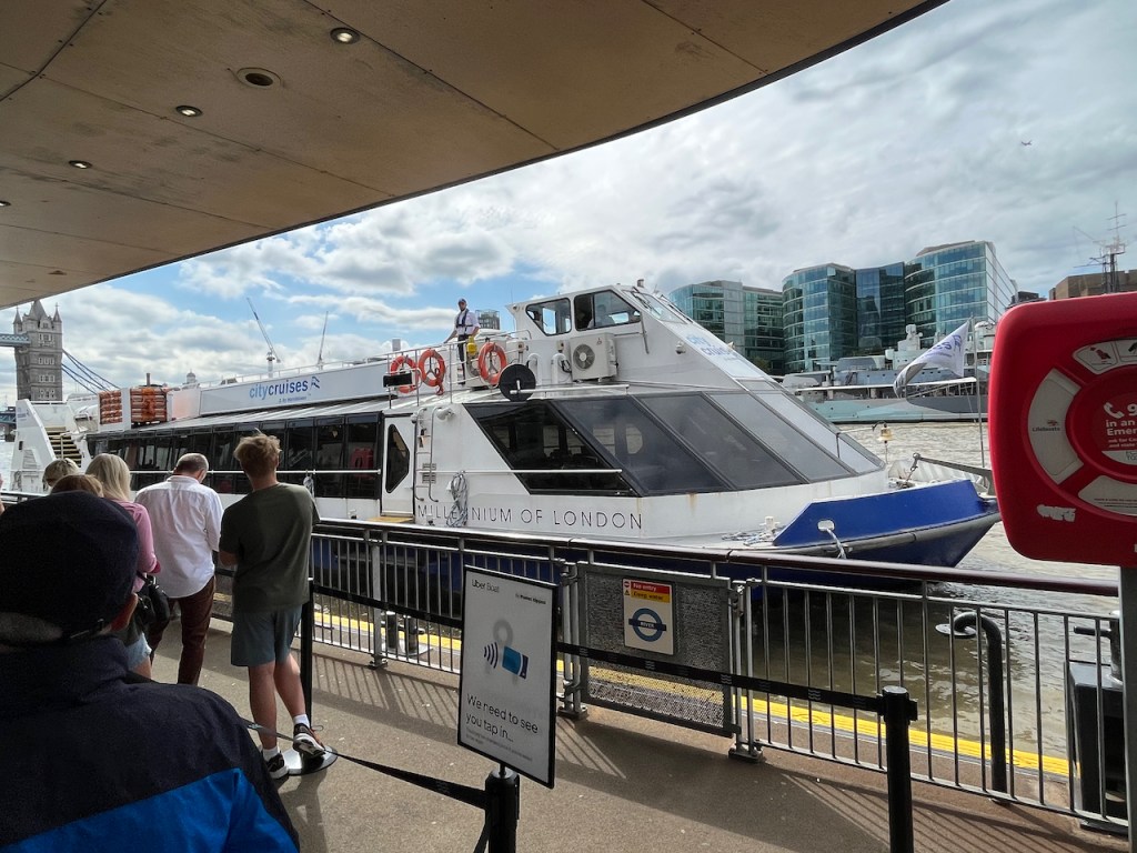 The Millennium of London boat, with a single deck indoors and an open deck on the top.