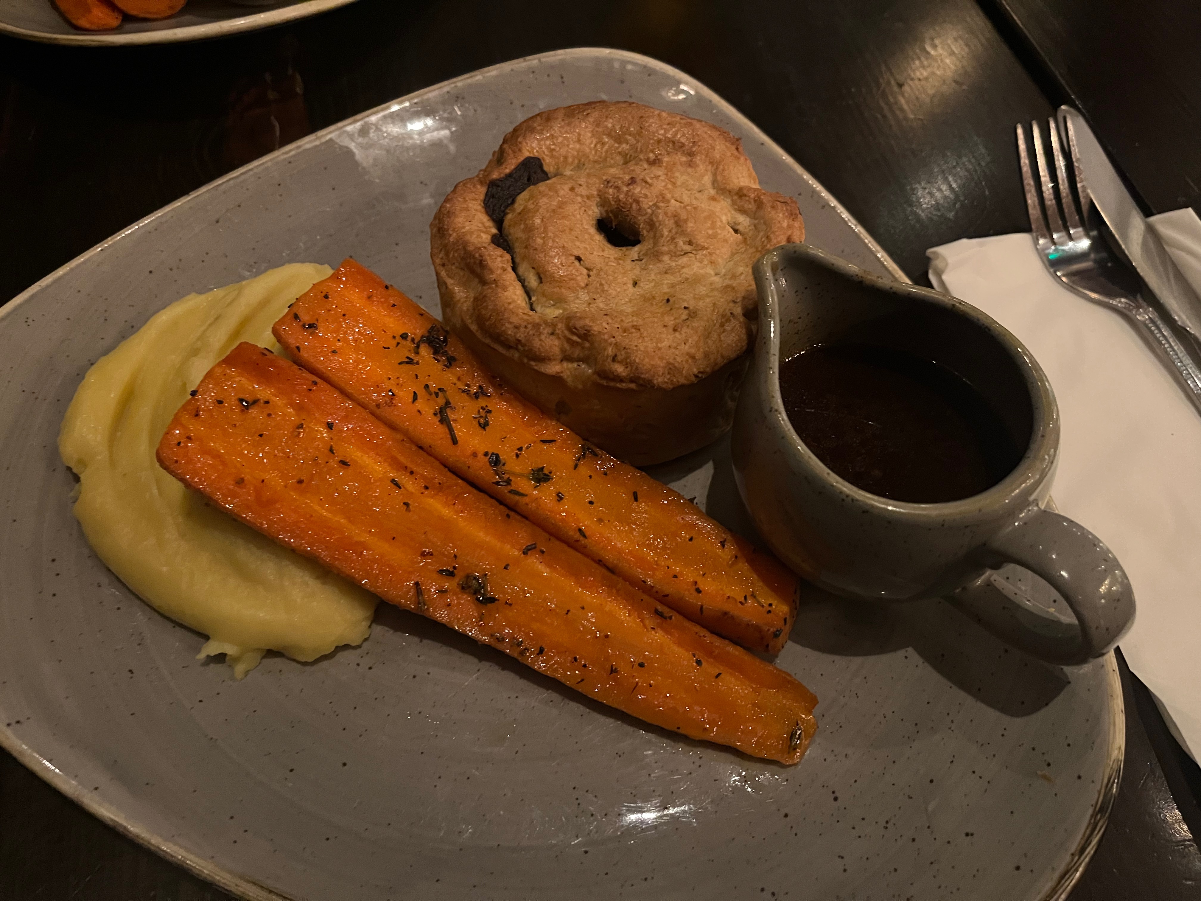 Steak & Nicholson's Pale Ale Pie, with gravy, carrots and mashed potato.