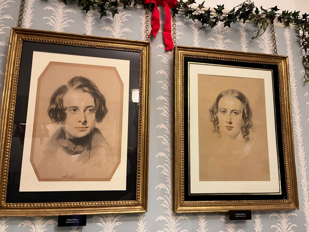 Portraits of Charles and Catherine Dickens in the Charles Dickens Museum.