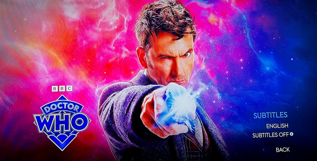 Subtitles menu on the Blu-ray for the Doctor Who 60th Anniversary Specials, showing David Tennant's Doctor pointing his sonic screwdriver directly at us. In the bottom right corner are options to turn the English subtitles on and off. The Doctor Who logo is in the bottom left corner.