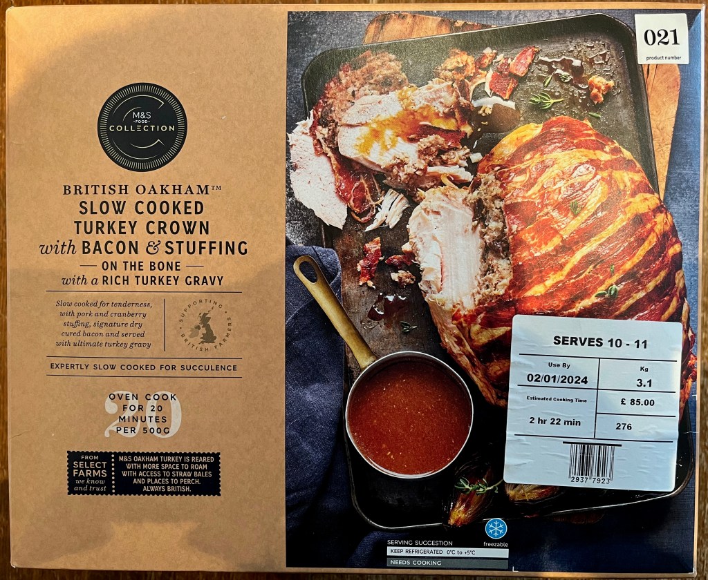 M&S British Oakham slow cooked turkey crown with bacon & stuffing, on the bone with a rich turkey gravy.
