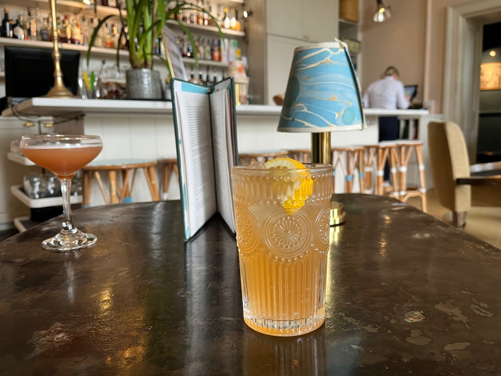 Cocktails for Emily and I at the Bingham Riverhouse. My Dark & Stormy cocktail isn't very dark in colour at all, it's actually more of a light orange colour.