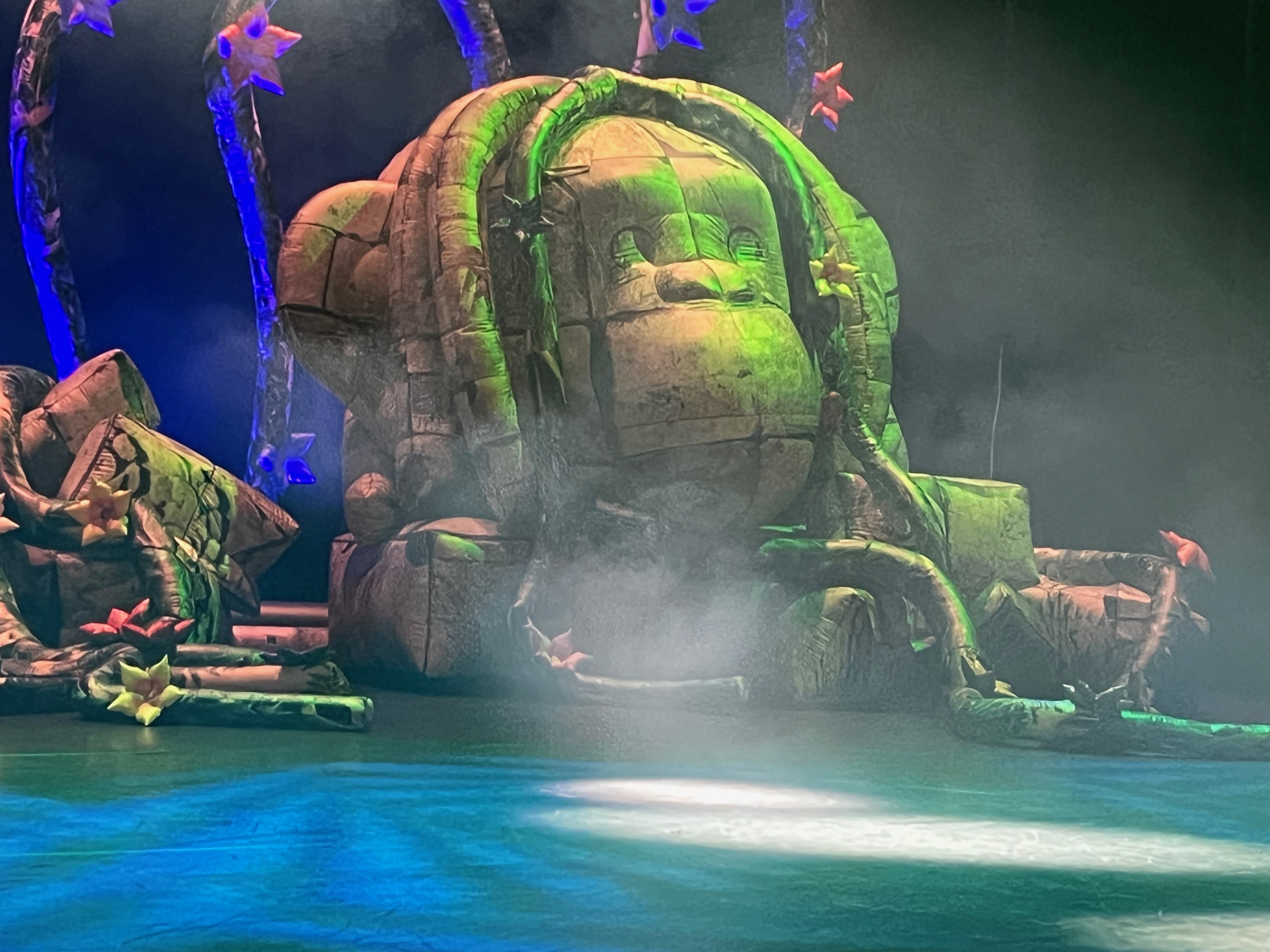 A large inflatable sculpture on the stage for Ross Noble's show Jibber Jabber Jamboree, that looks like a rock carved to resemble a monkey's head.