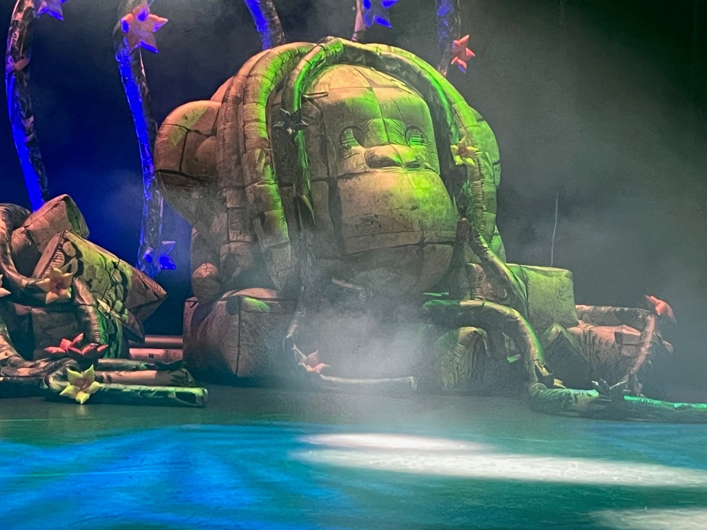 A large inflatable sculpture on the stage for Ross Noble's show Jibber Jabber Jamboree, that looks like a rock carved to resemble a monkey's head.