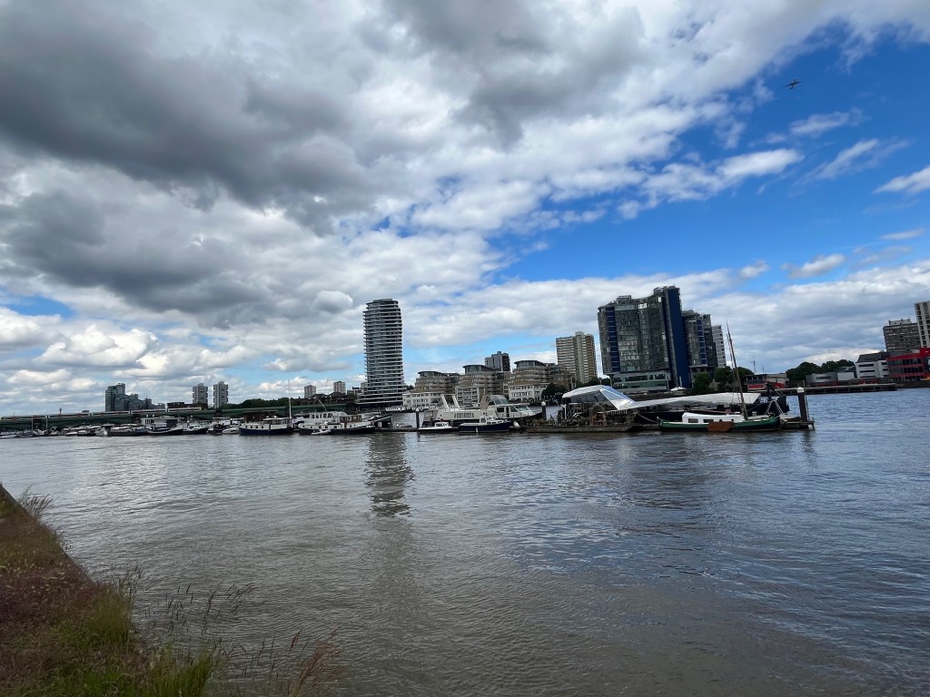 Boats moored by a long jetty in Imperial Wharf, viewed from the west end of the wharf.