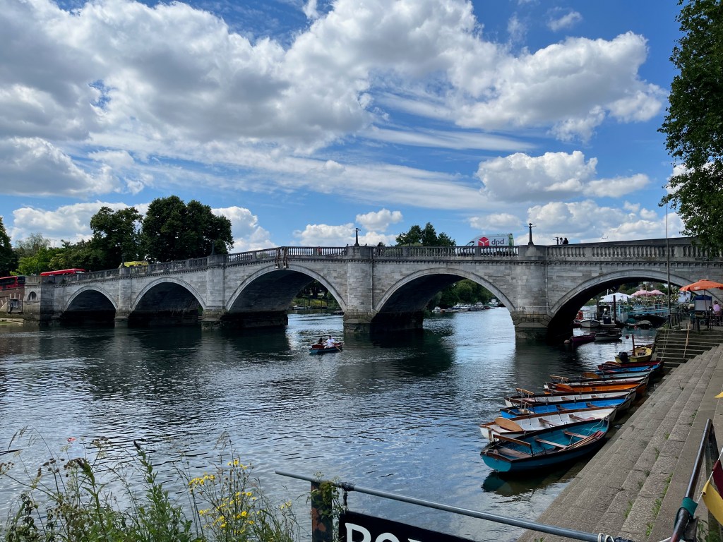 Richmond Bridge, a stone bridge with 5 arches. The bridge gently slopes up from each side to the tallest central point, so the archway in the centre is the biggest.
